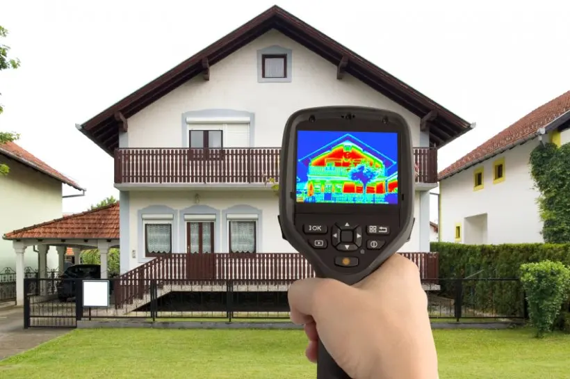 Infrared thermal inspection of a house showing heat signatures
